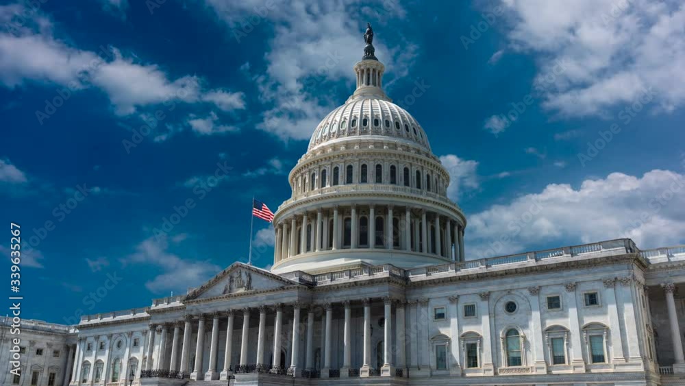 Zooming in to the US Capitol in this time lapse cinemagraph with beautiful blue sky and clouds slowly moving to the right. Zooming in to the US Capitol in this time lapse cinemagraph with beautiful blue sky and clouds slowly moving to the right.