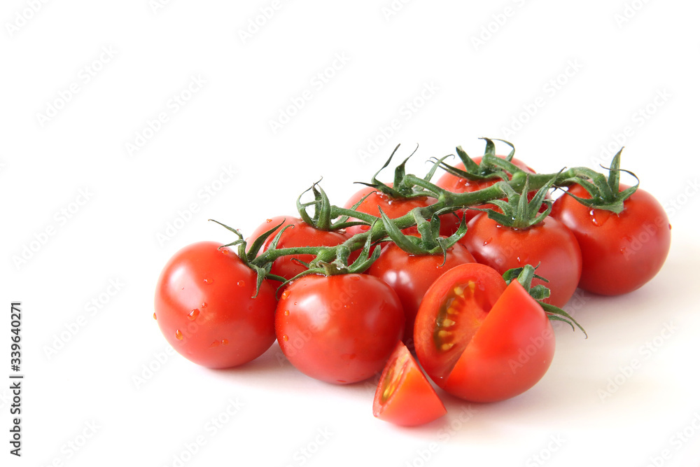 Mini panicle tomatoes on white background