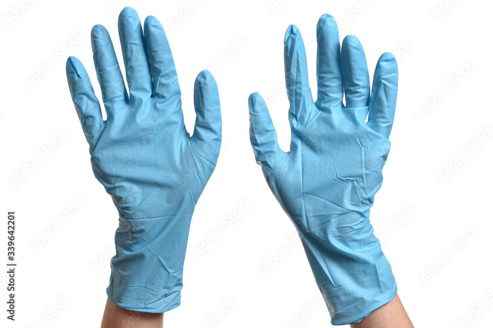 Hands in blue protective gloves over white Hands in blue protective gloves over white