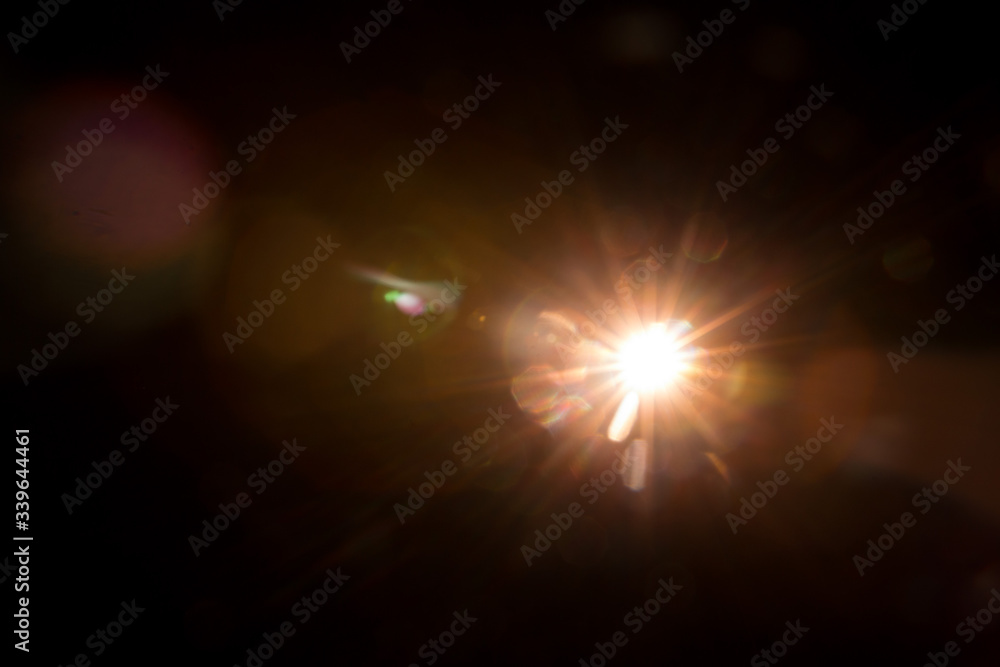 Abstract Natural Sun flare on the black background. Abstract Natural Sun flare on the black background.