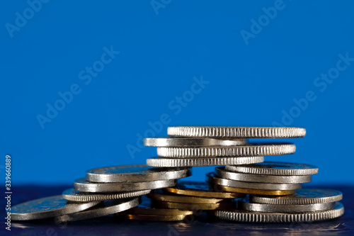 Swiss coins on blue background