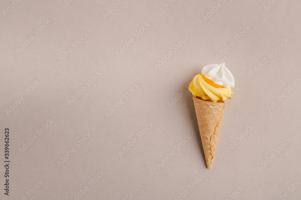 Small crispy waffle ice cream cups with colored marshmallows on a pastel background Small crispy waffle ice cream cups with colored marshmallows on a pastel background