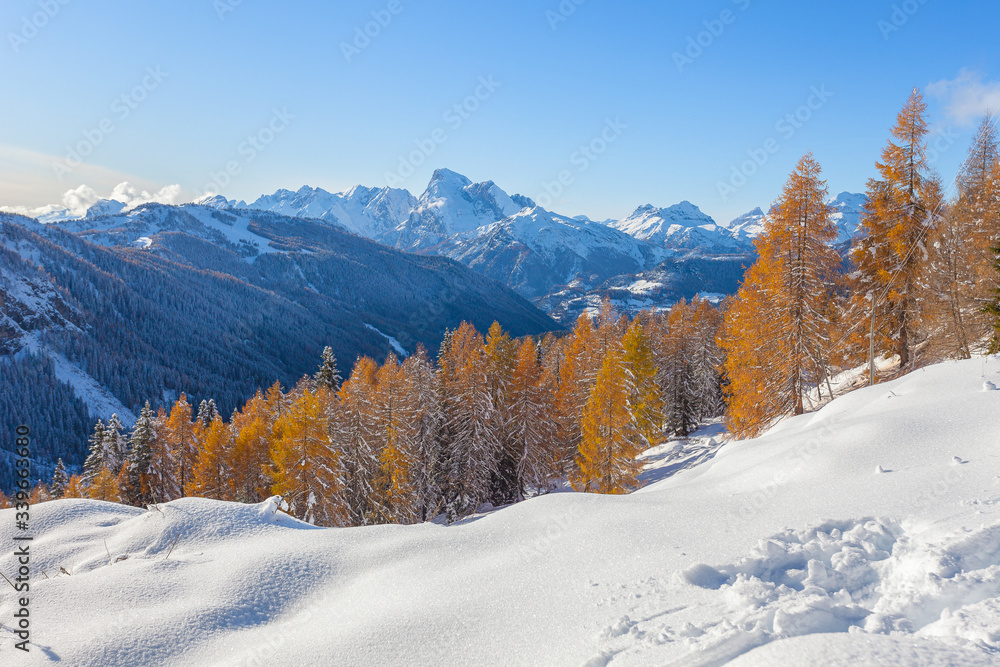 Mount Marmolada winter panorama in a sunny day, Dolomites, Italy. Concept: winter landscapes, Christmas atmosphere, Unesco world heritage, calm and serenity Mount Marmolada winter panorama in a sunny day, Dolomites, Italy. Concept: winter landscapes, Christmas atmosphere, Unesco world heritage, calm and serenity