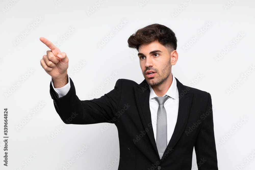 Young businessman over isolated white background pointing away Young businessman over isolated white background pointing away