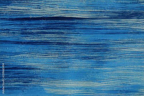 Background of water-based paint in blue and blue tones, applied to paper