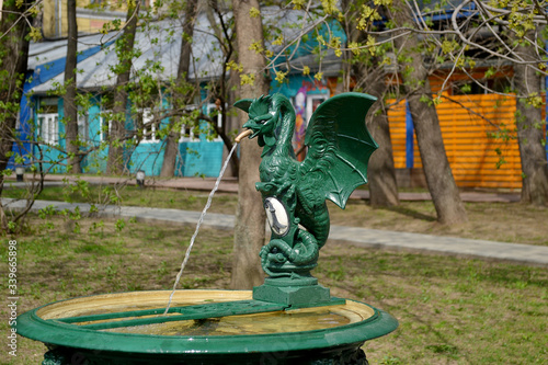 Basilisk fountain in the Bauman Garden.  Moscow. photo