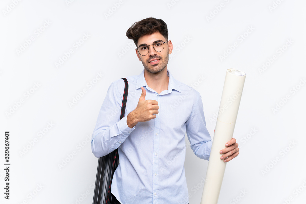 Young architect man over isolated white background giving a thumbs up gesture Young architect man over isolated white background giving a thumbs up gesture