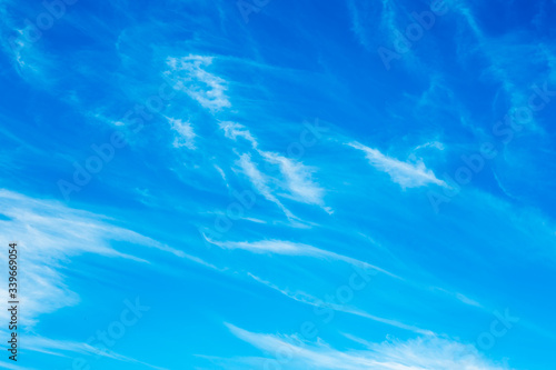 White cloud with blue sky background. Beautiful blue texture.