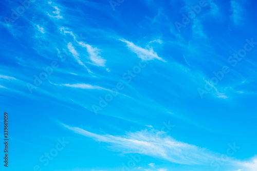 White cloud with blue sky background. Beautiful blue texture.