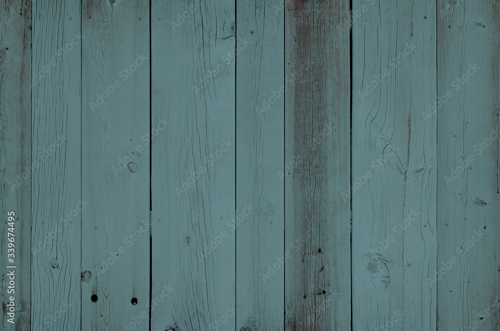 Fototapeta premium Faded blue gray reclaimed wood surface with aged boards. Wooden planks with grain and texture. 