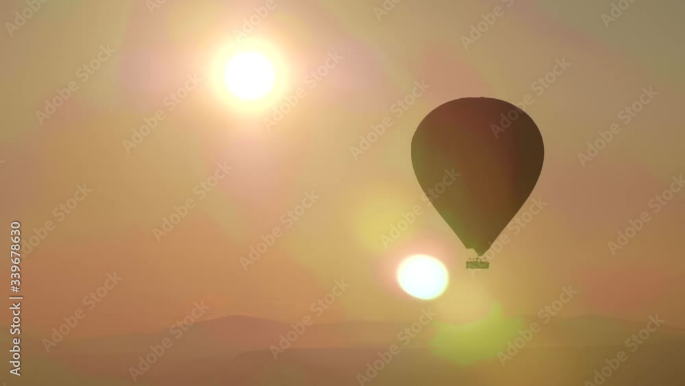 Balloon silhouette at dawn in Cappadocia, Turkey. Balloon silhouette at dawn in Cappadocia, Turkey.