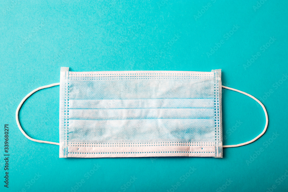 Simple medical mask on a colorful background. Creative. Simple medical mask on a colorful background. Creative.