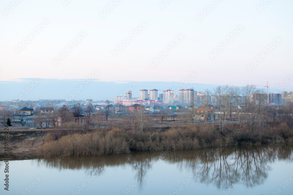 View of the river neighbourhoods from the embankment. Tyumen, Russia.