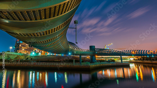 Photography night view of the Modern Pedestrian bridge in abu dhabi