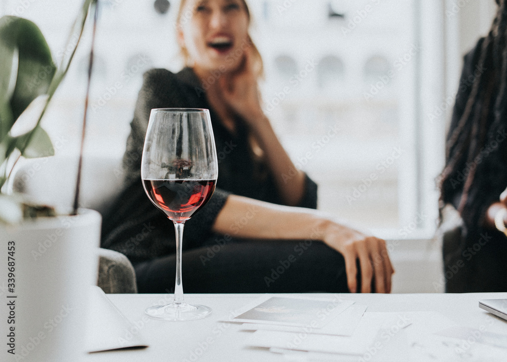 Classy businesswomen enjoying wine Classy businesswomen enjoying wine