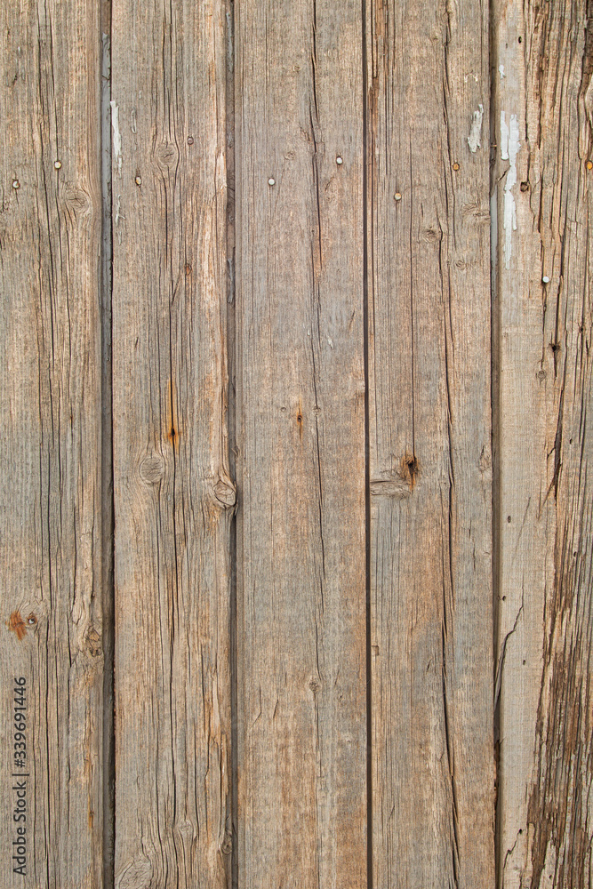 Naklejka premium background of old wooden boards with cracks and nails