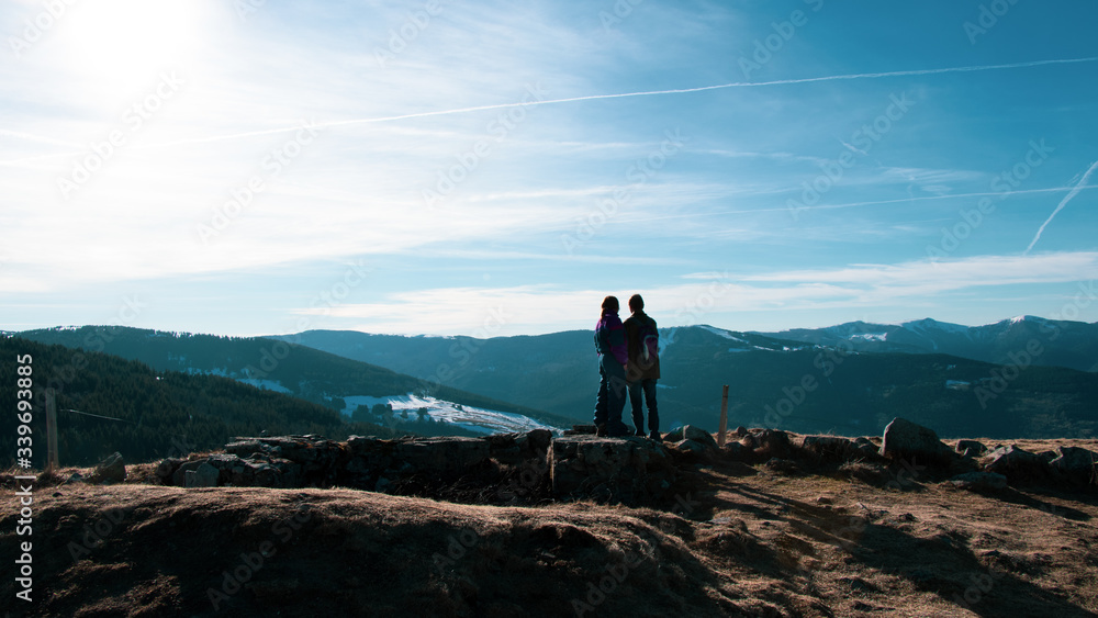 hiking couple in the mountains