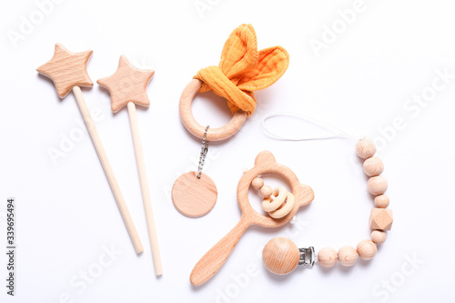 Set of baby toys and accessories on white background. Newborn stuff. Flat lay, top view