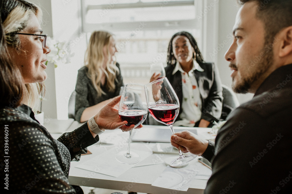 Business people celebrating with wine Business people celebrating with wine