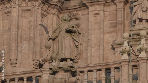 Statue and sculpture detail on facade of Santiago de Compostela cathedral at sunset. Galicia, Spaindetail