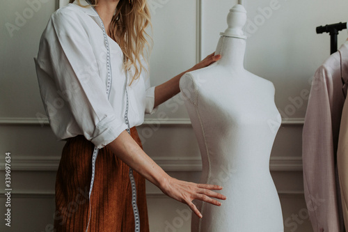 Professional fashion designer working photo