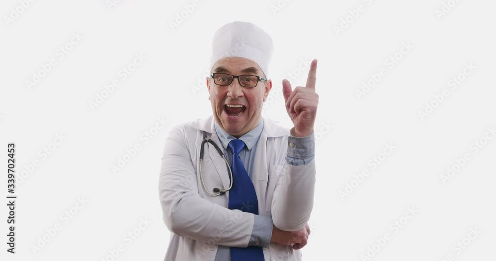 Doctor standing on white background thinks, slowmotion, 6k. Doctor standing on white background thinks, slowmotion, 6k.