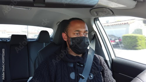 Black uber driver with face mask