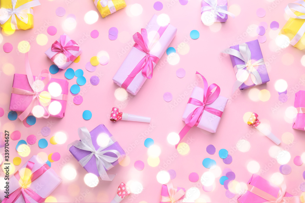 Many Birthday gifts and decor on color background