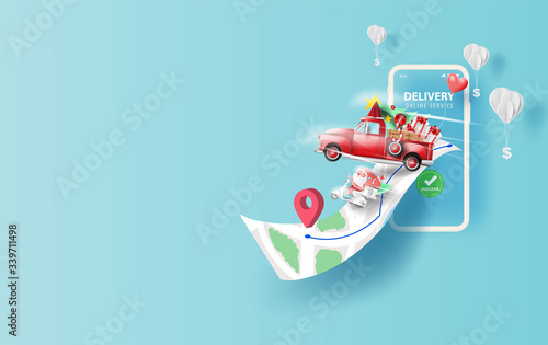 Merry Christmas Online delivery smartphone concept.Fast respond delivery package shipping on mobile.Online order tracking world map location.Logistic delivery service.Santa Claus drive motorcycle.