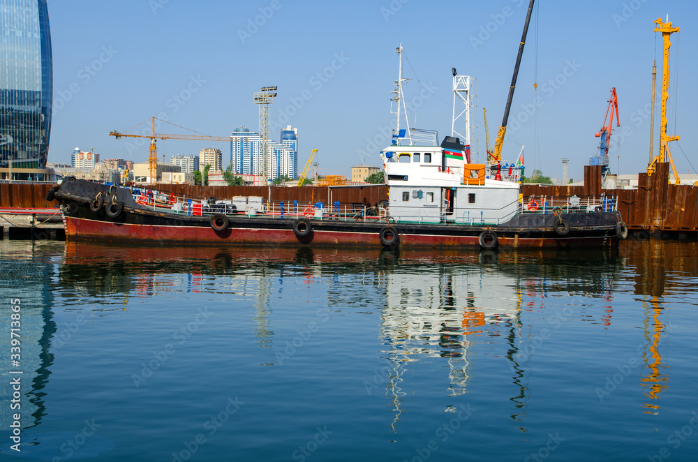 Ship moored to the pier with cranes Ship moored to the pier with cranes