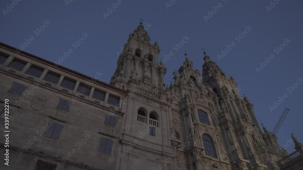 Santiago de Compostela Cathedral view from Obradoiro square at dusk. Low angle view. Cathedral of Saint James. Galicia, Spain Santiago de Compostela Cathedral view from Obradoiro square at dusk. Low angle view. Cathedral of Saint James. Galicia, Spain