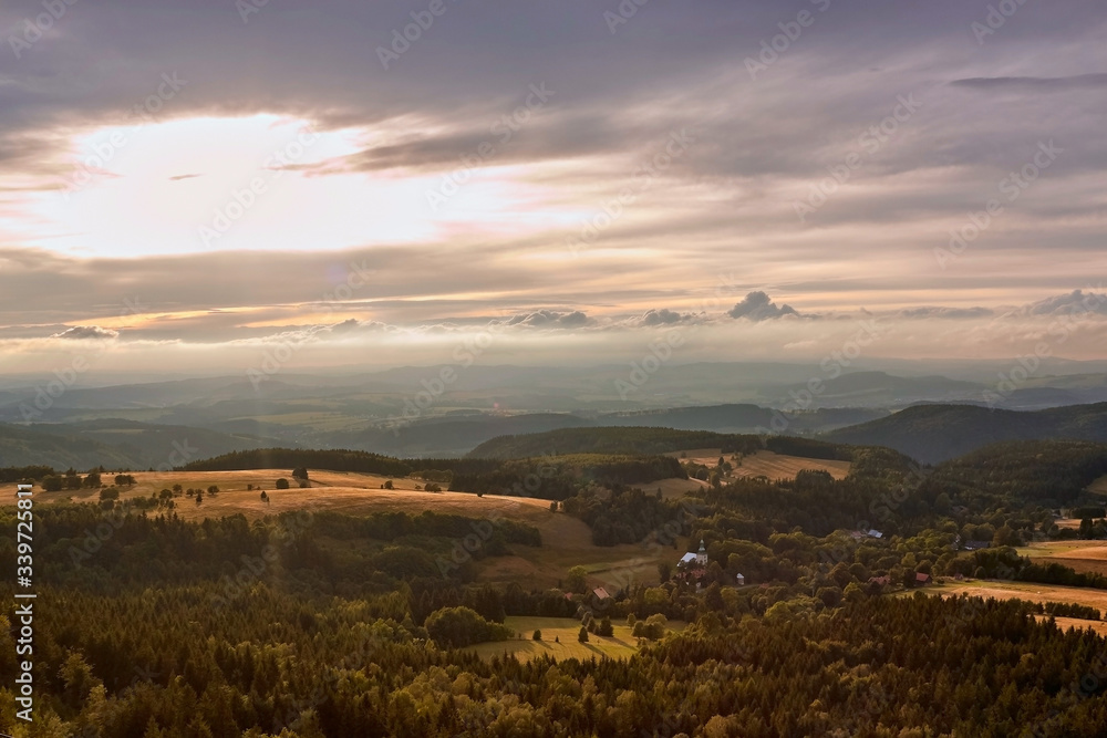 View from Szczeliniec Wielki peak in Table Mountains at sunset, Poland