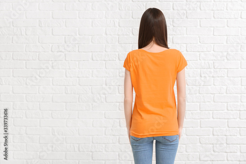 Woman in stylish t-shirt on...