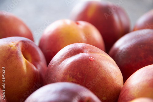 Fresh Peaches on a cutting board