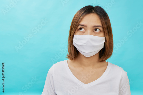 Brunette woman wearing face mask