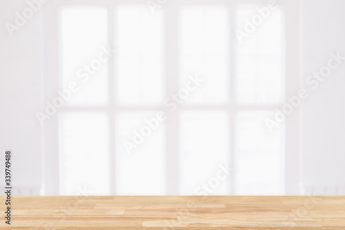 Empty wooden table and window room interior decoration background  product montage display can be used for display or montage your products.Mock up for display of product.