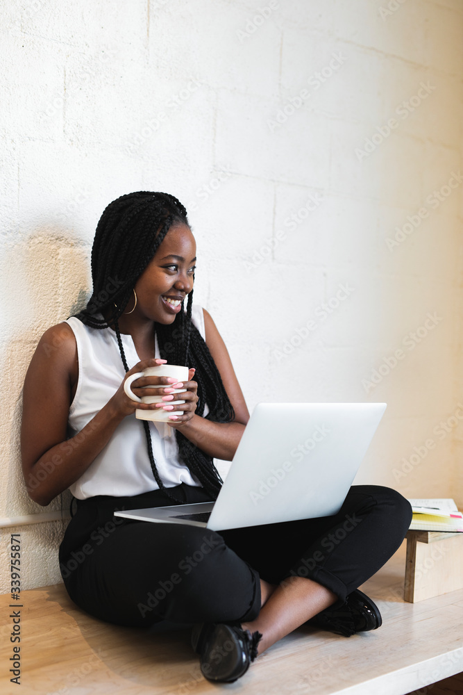 Woman holding coffee cup Woman holding coffee cup