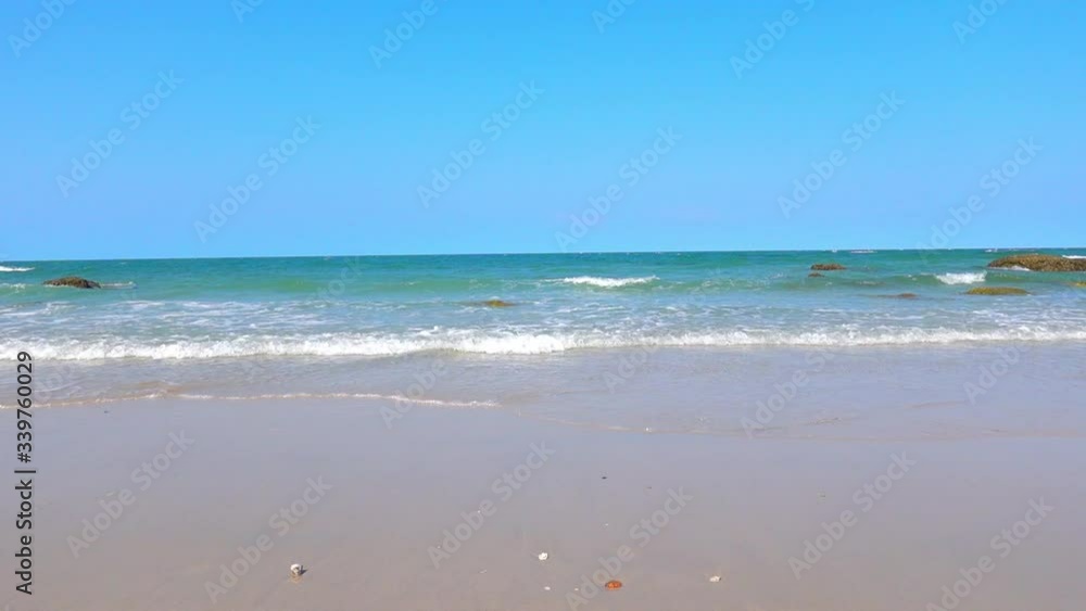 View of beach sea with blue sky in the summer. 4K UHD, Video Clip. View of beach sea with blue sky in the summer. 4K UHD, Video Clip.
