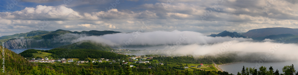 Panorama of low clouds over Bonne Bay at Norris Point Newfoundland in the evening