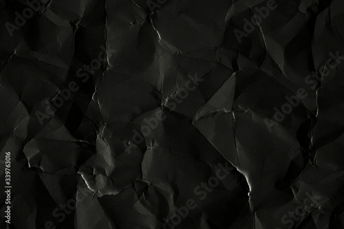 Scrunched black paper background photo