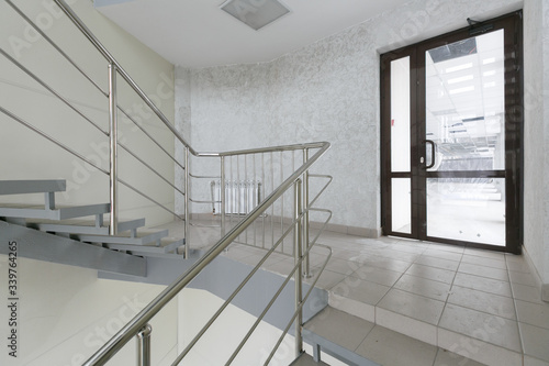 empty pure commercial office building undecorated in gray colors.open space office