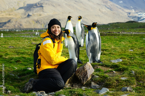 Curious Penguin Poking Woman