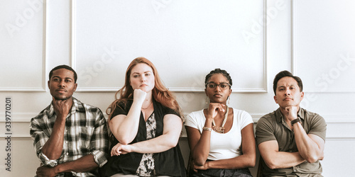 Фотография Diverse people sitting in a row