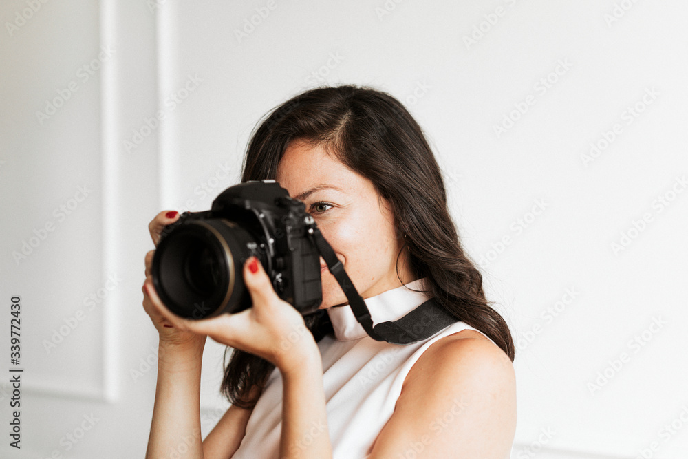 Female photographer at a shoot Female photographer at a shoot
