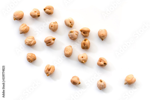 Chick Peas Scattered over White Isolated Top View