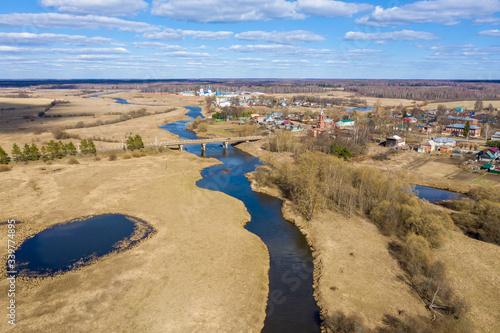 Panorama of the village of Dunilovo and the Teza River, Ivanovo Region, Russia on a sunny spring day. photo