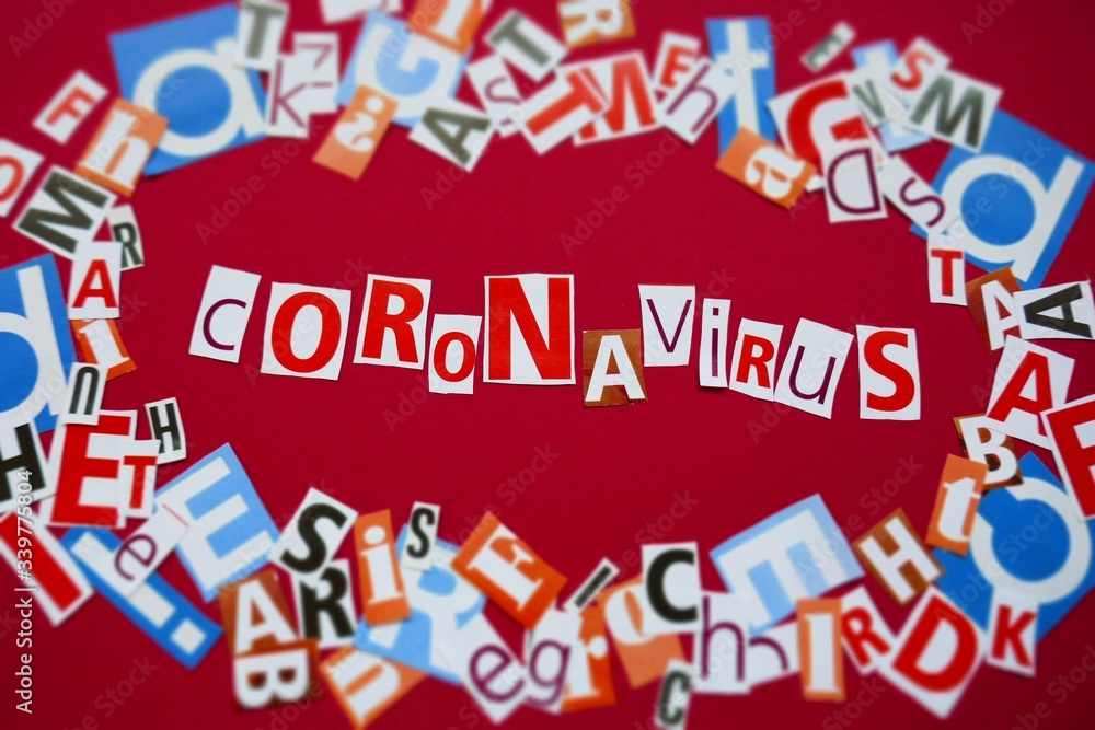 Fototapeta premium Coronavirus infection epidemic concept.Coronavirus News. Coronavirus statistics.word Coronavirus from newspaper letters on a red background. Medicine and Health.Informational News Concept