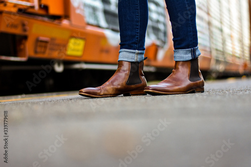 Walking boots next to train © Alyssa