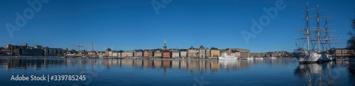 Gamla Stan from a crowned bridge a sunny morning in Stockholm.