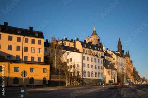 Old part of the district Södermalm with houses on a hill side in Stockholm a sunny morning. 